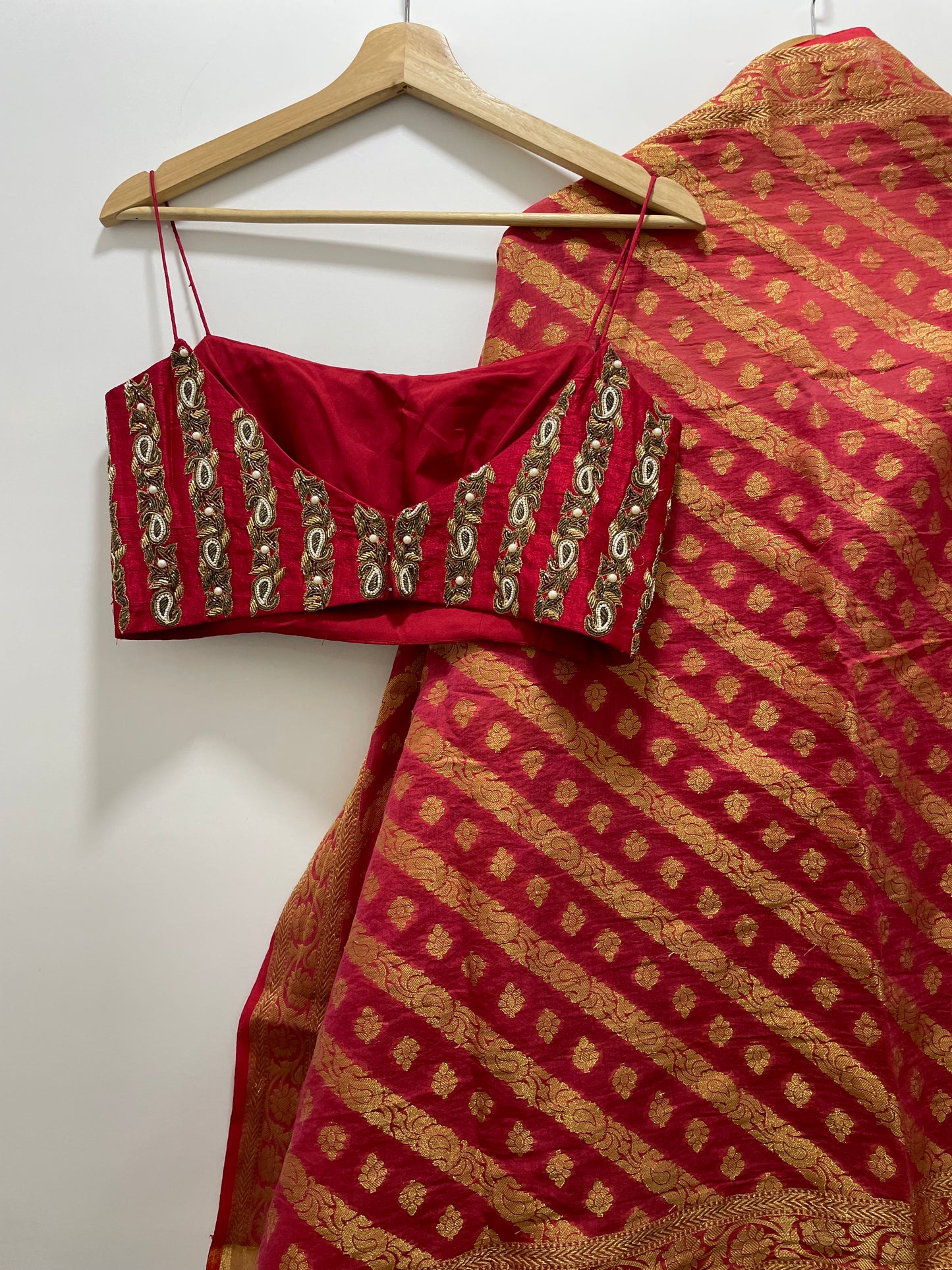 Deep red linear embroidered blouse with a high waisted chanderi lehenga & handwoven dupatta