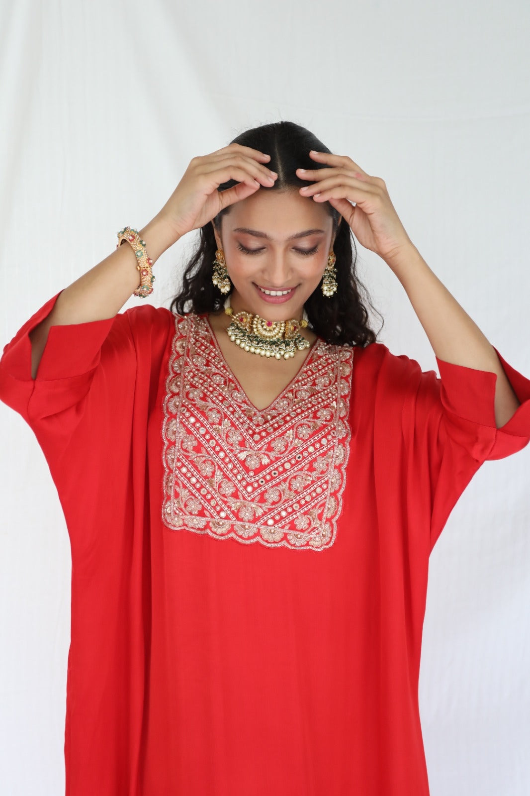 Red kaftan and pyjama set with an intricately hand embroidered yoke