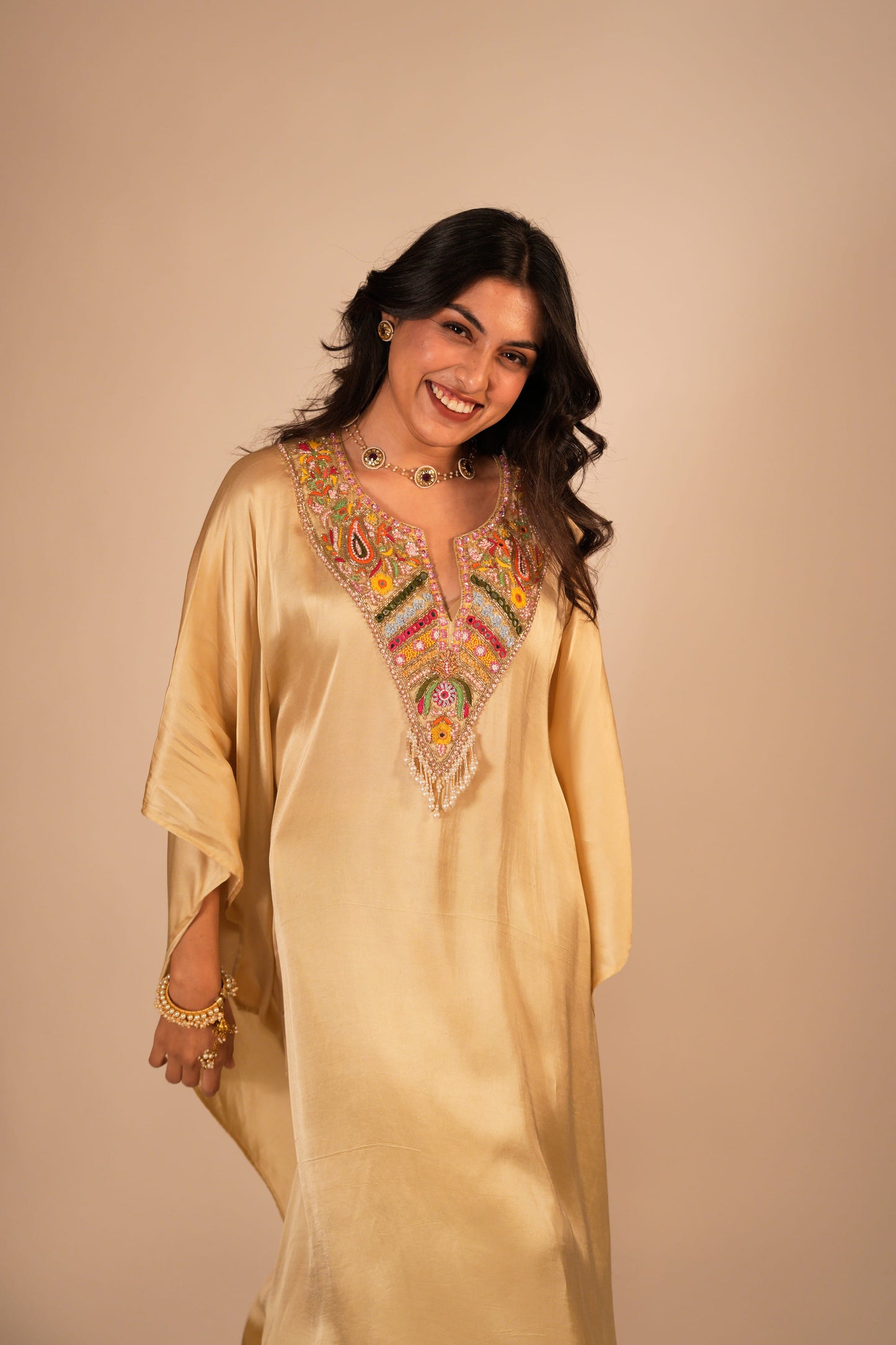Champagne kaftan set with a hand embroidered colorful neckline