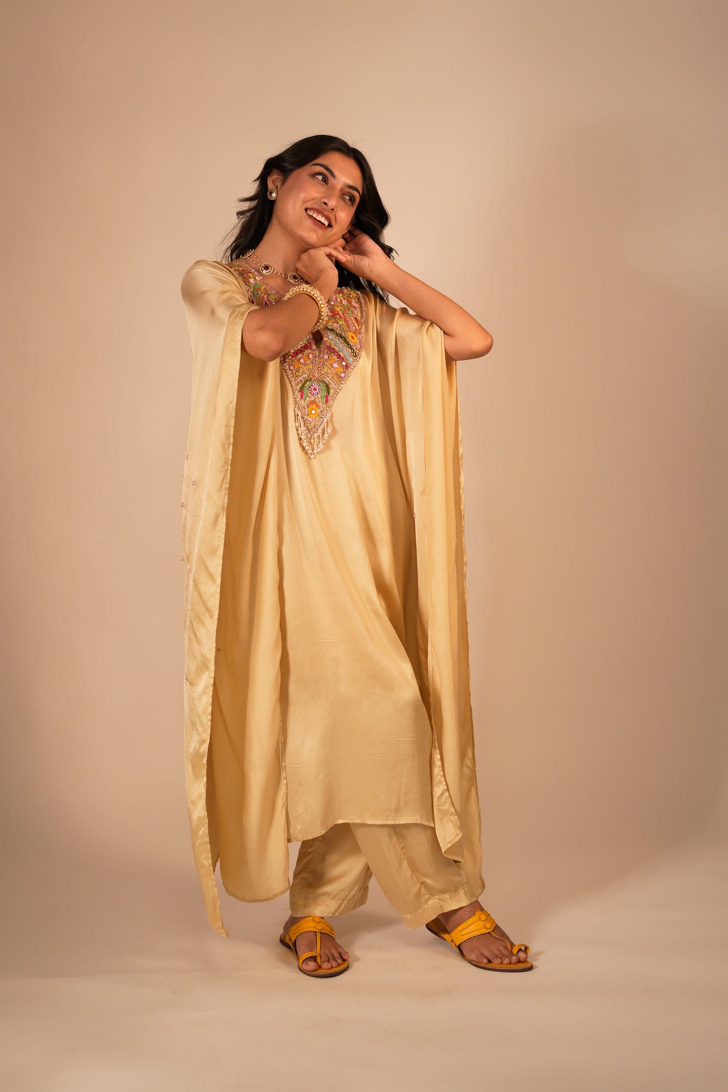 Champagne kaftan set with a hand embroidered colorful neckline