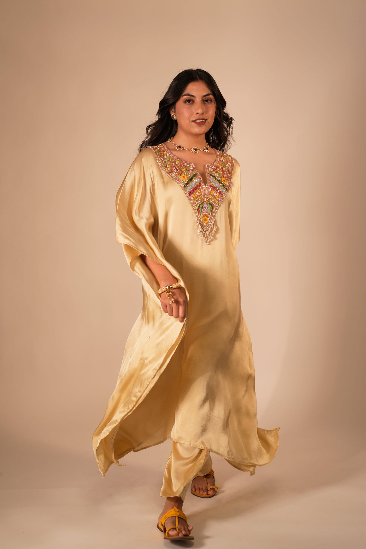 Champagne kaftan set with a hand embroidered colorful neckline