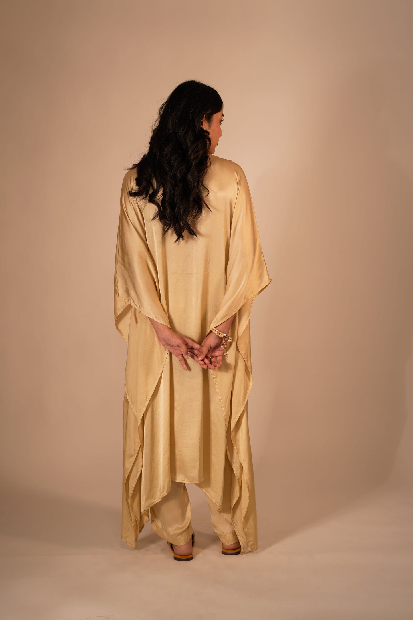 Champagne kaftan set with a hand embroidered colorful neckline