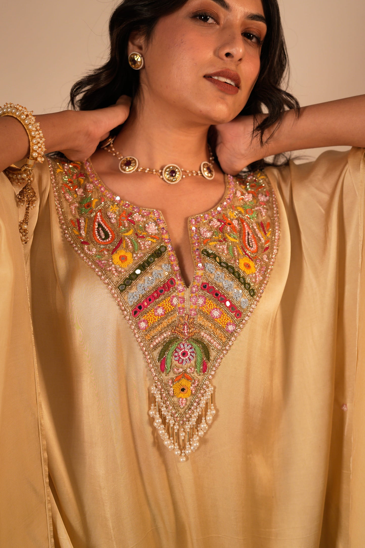 Champagne kaftan set with a hand embroidered colorful neckline