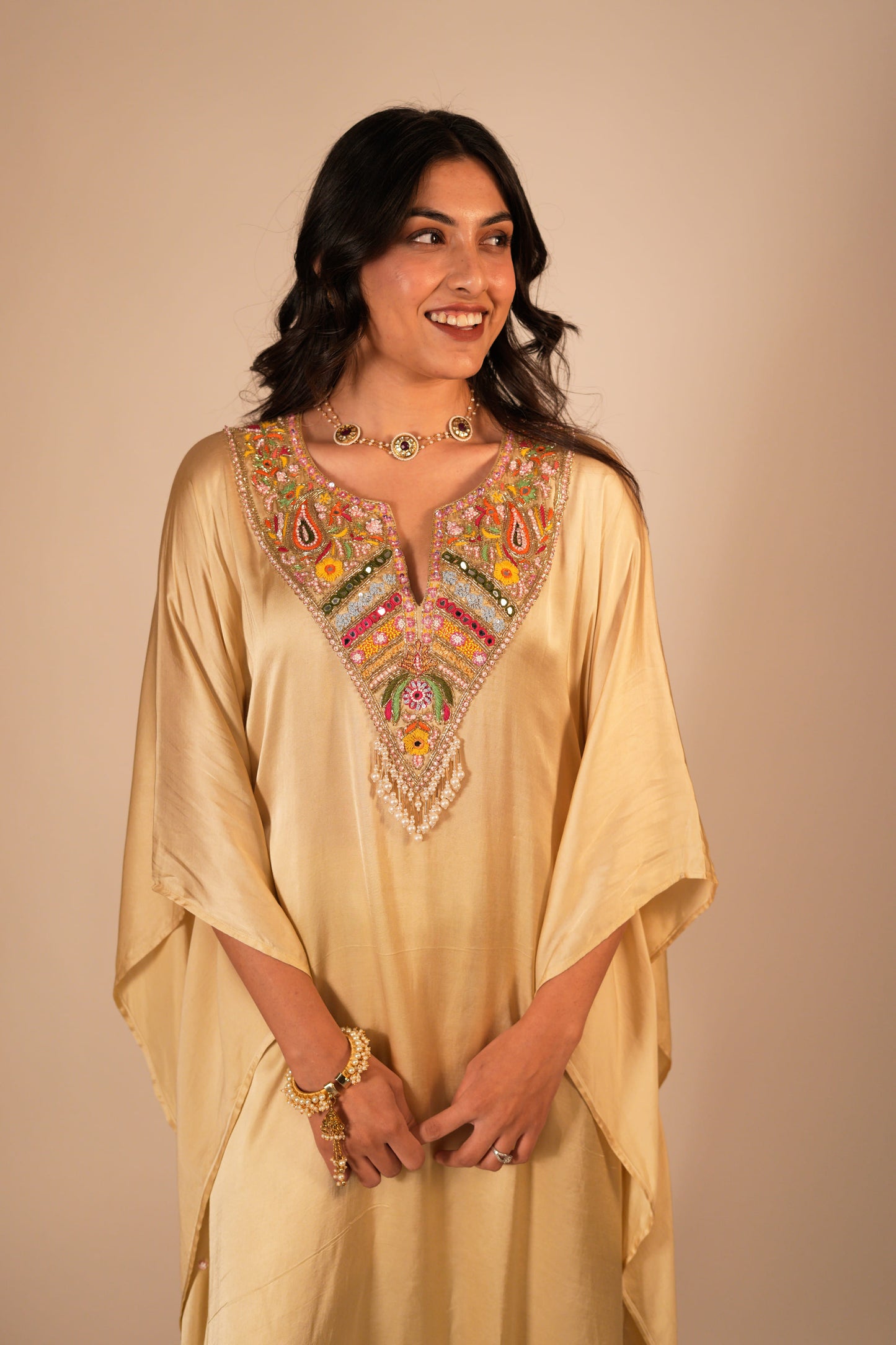 Champagne kaftan set with a hand embroidered colorful neckline