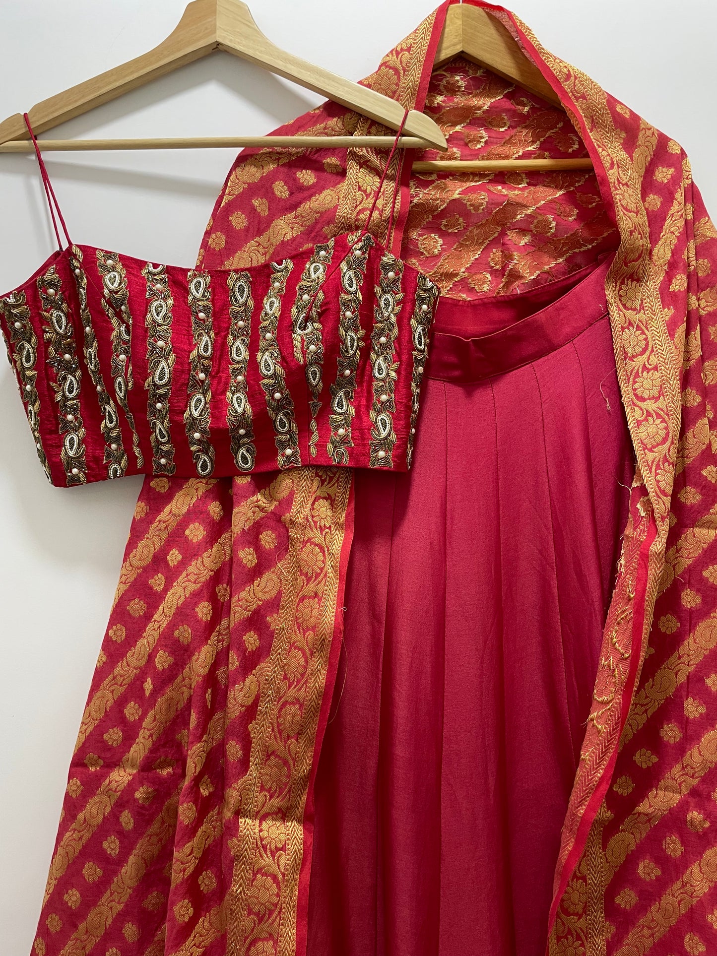Deep red linear embroidered blouse with a high waisted chanderi lehenga & handwoven dupatta