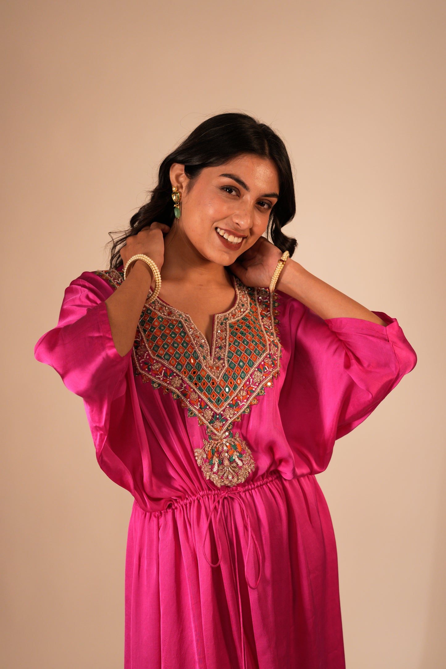 Hot pink high low kaftan set with a hand embroidered neckline and tie up