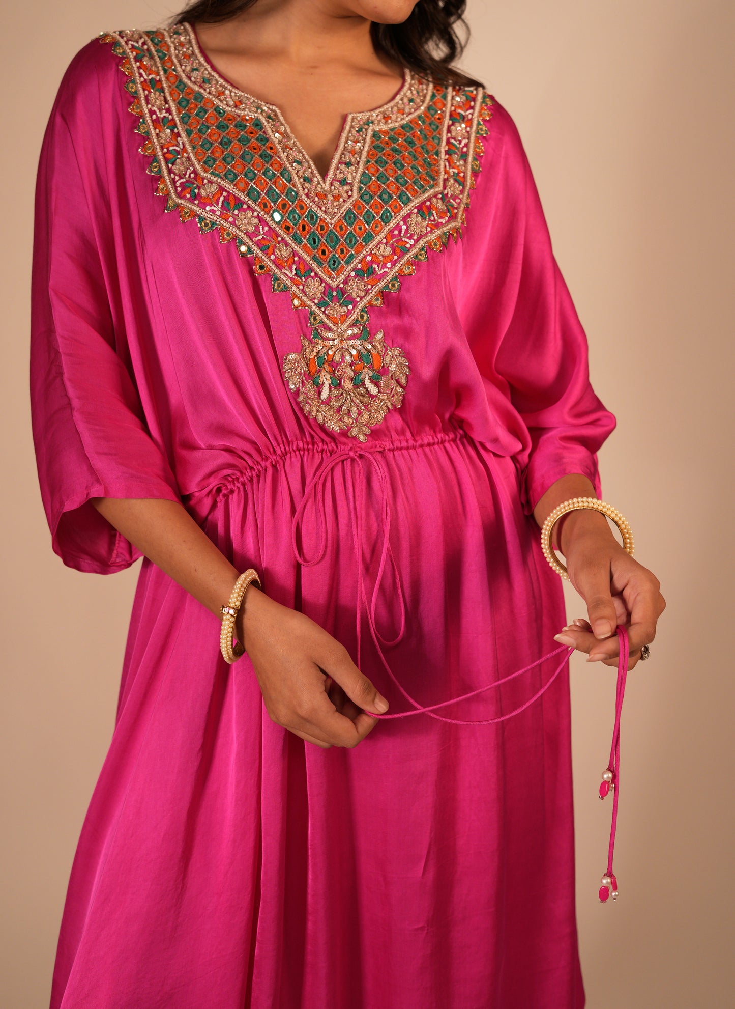 Hot pink high low kaftan set with a hand embroidered neckline and tie up