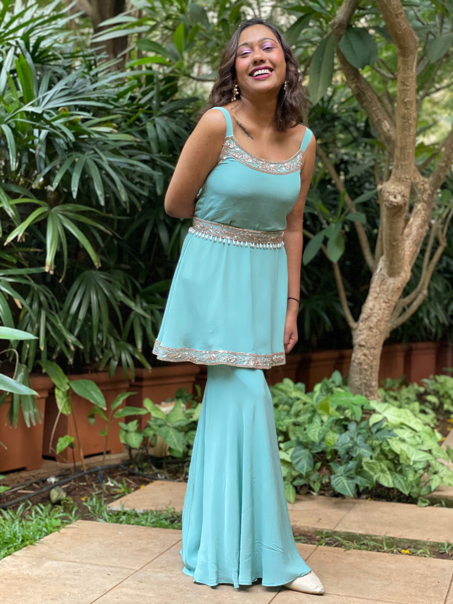 Dusty green short kurta and gharara with a hand embroidered belt