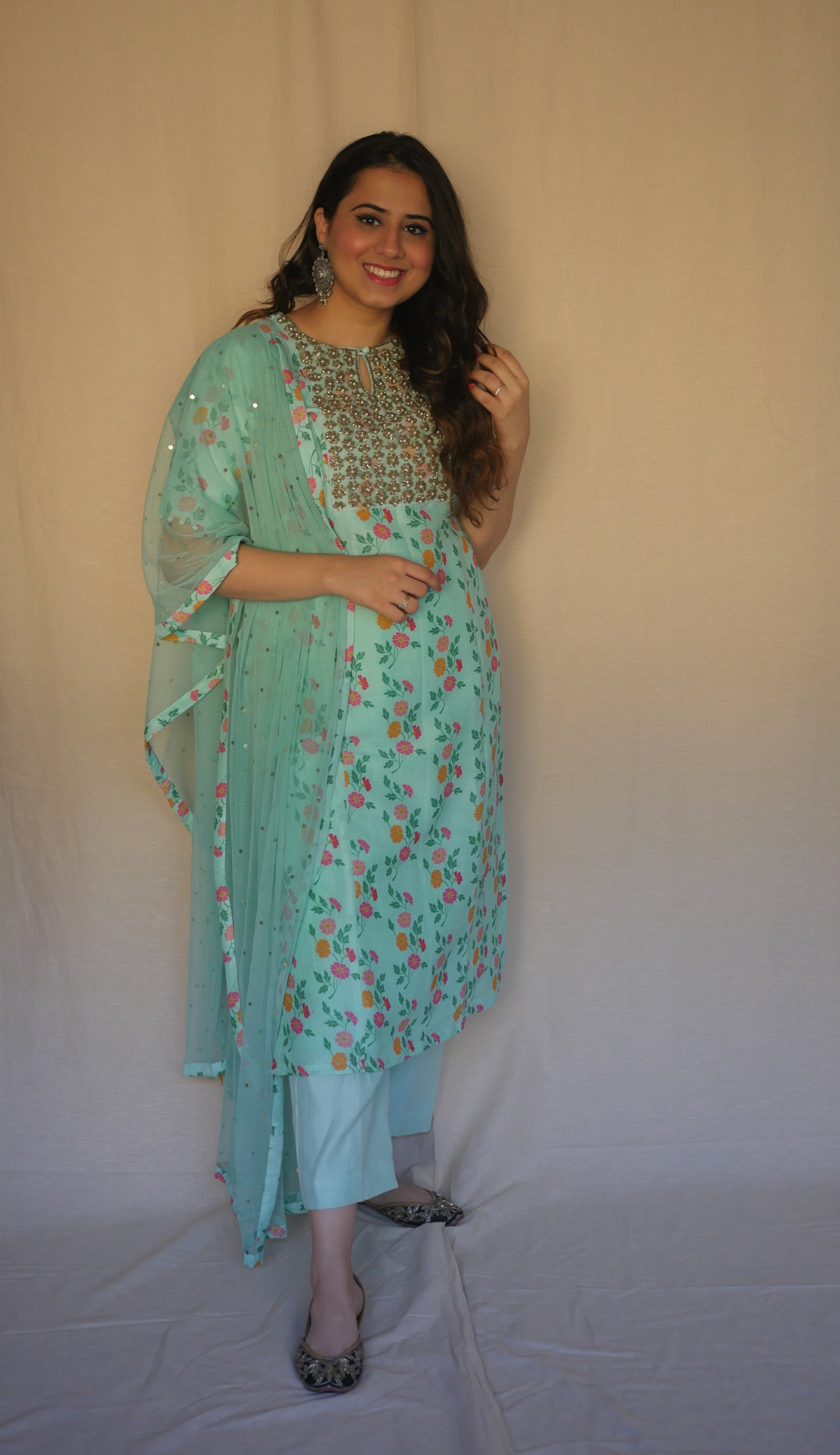 Aqua floral printed kurta with a hand embroidered yoke, pyjama and dupatta