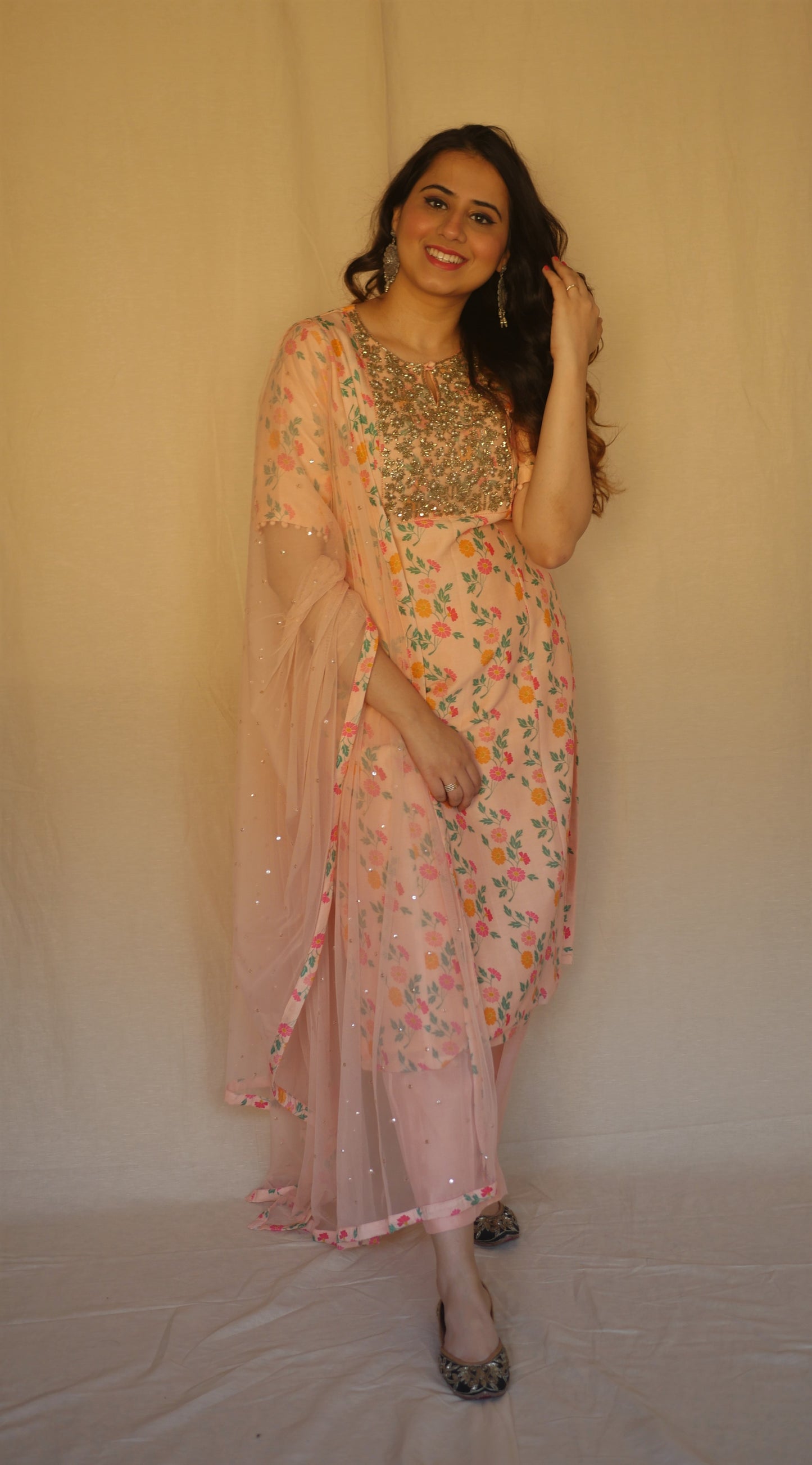Baby pink floral printed kurta with a hand embroidered yoke, pyjama and dupatta