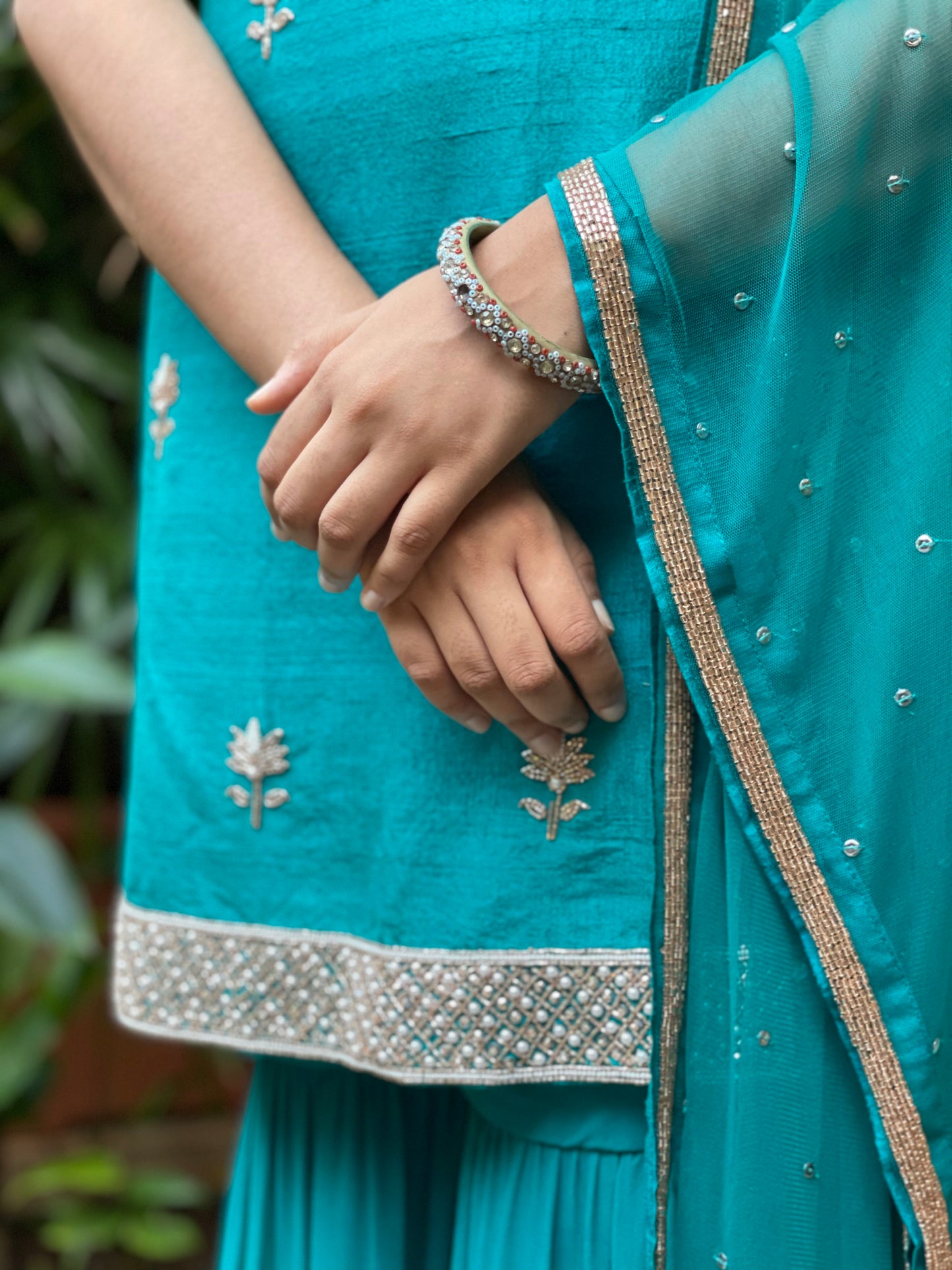 Peacock blue hand embroidered kurta and dupatta with a layered gharara