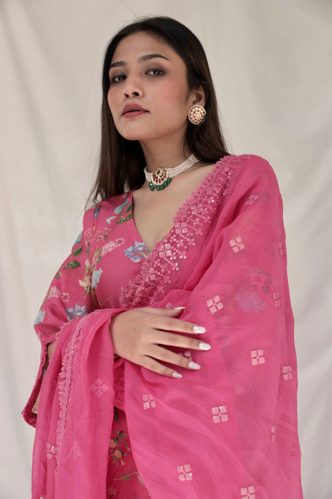 Deep pink floral printed kurta set with an embellished organza dupatta