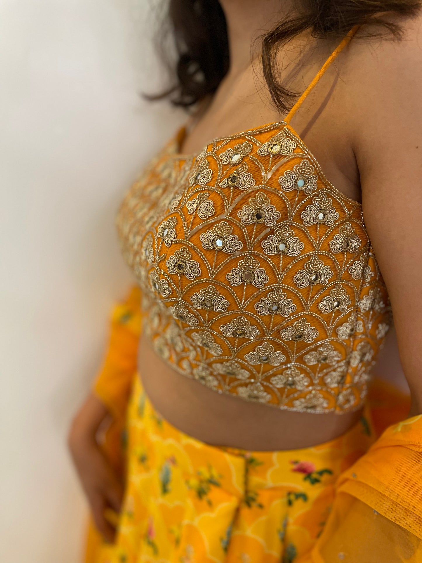 Hand embroidered blouse with a high waisted floral printed lehenga and dupatta