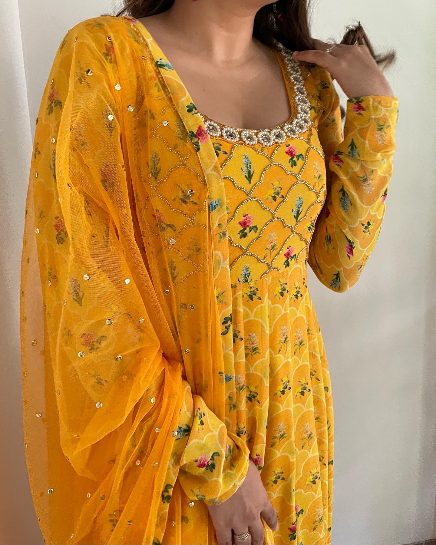 Yellow floral printed anarkali set with an embellished bodice
