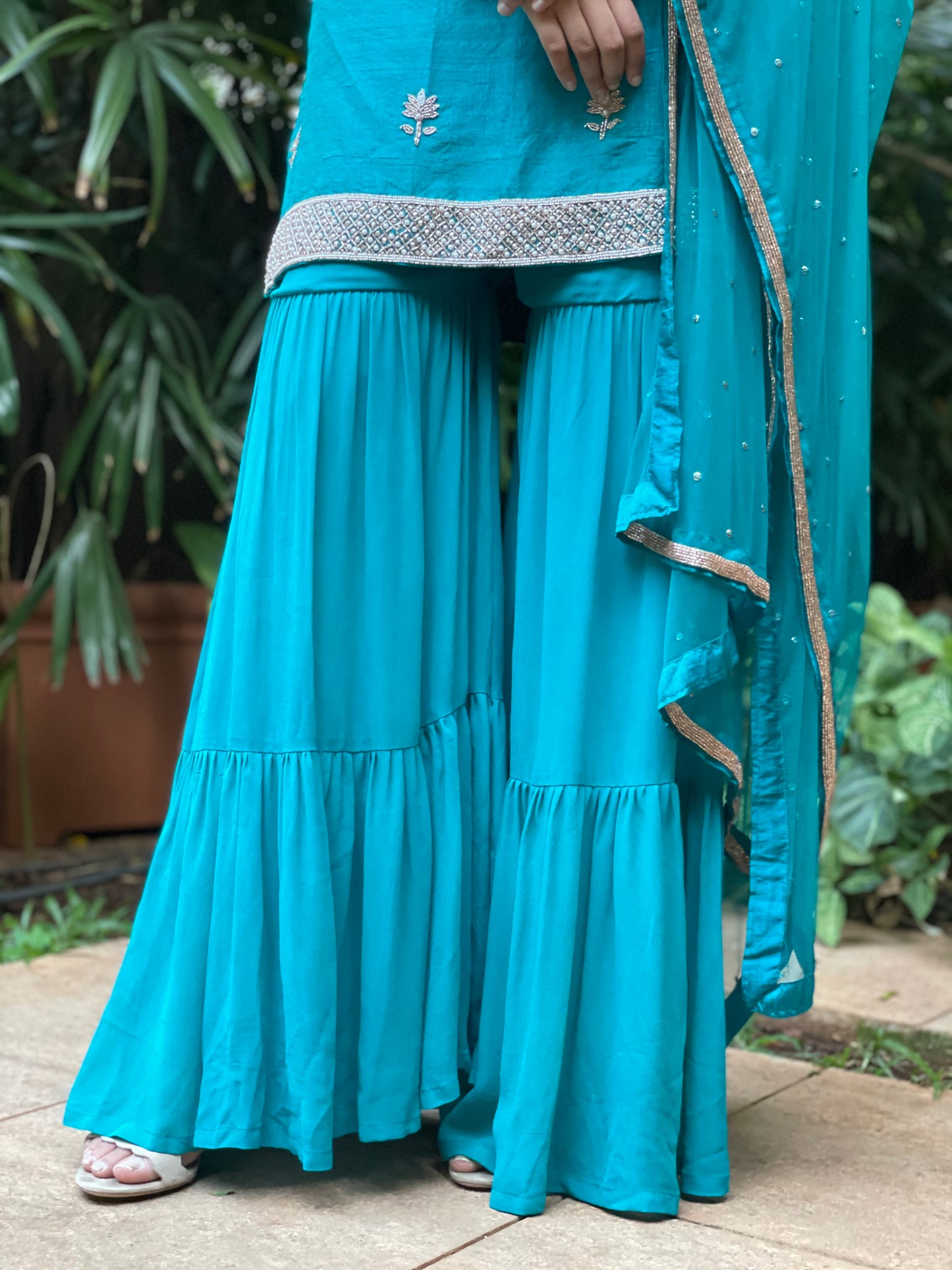 Peacock blue hand embroidered kurta and dupatta with a layered gharara