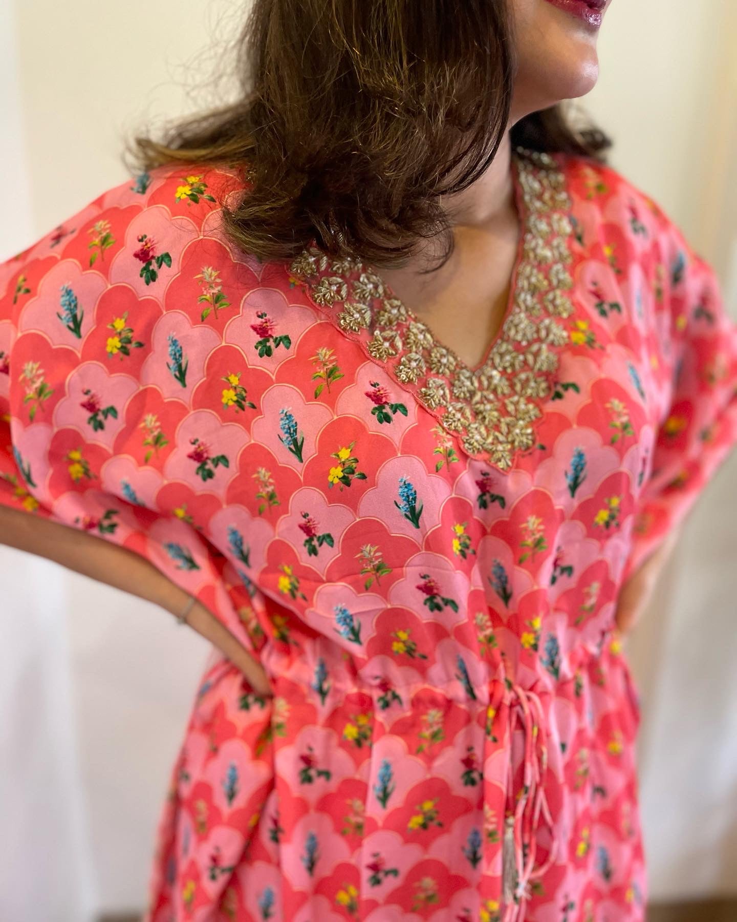 Pink floral printed kaftan with a hand embroidered neckline