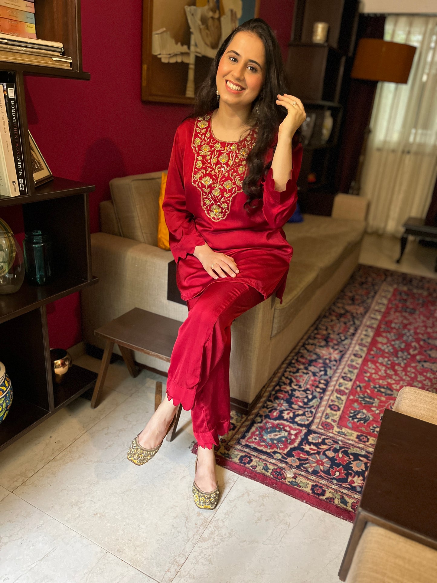 Deep red short kurta with a hand embroidered yoke and straight pants with scallop detailing