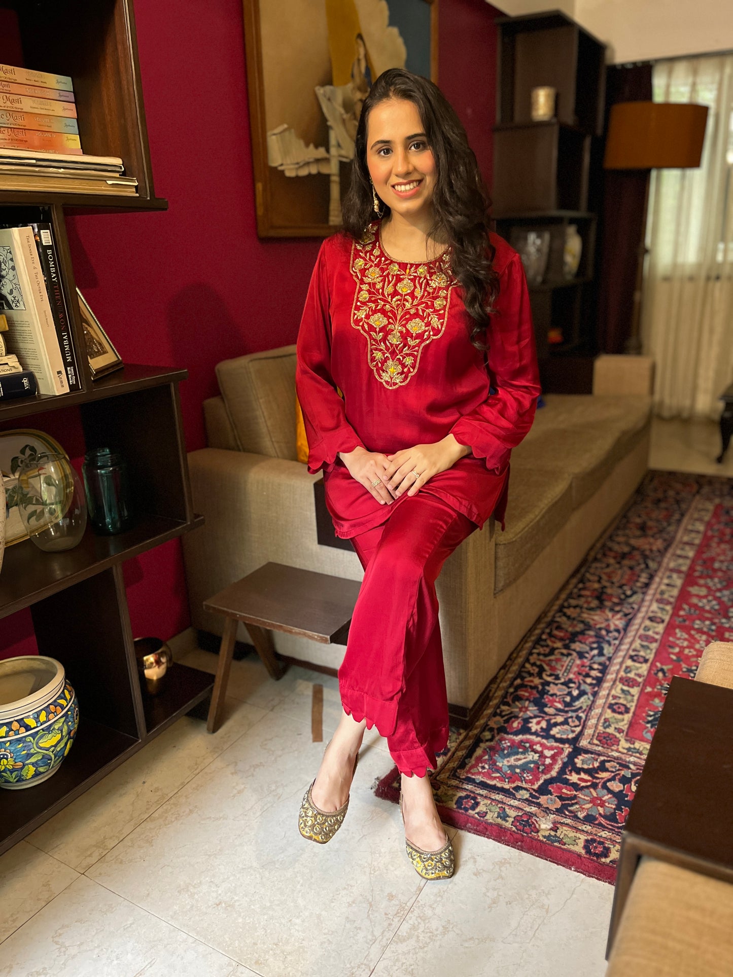 Deep red short kurta with a hand embroidered yoke and straight pants with scallop detailing