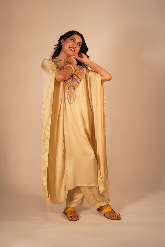 Champagne kaftan set with a hand embroidered colorful neckline