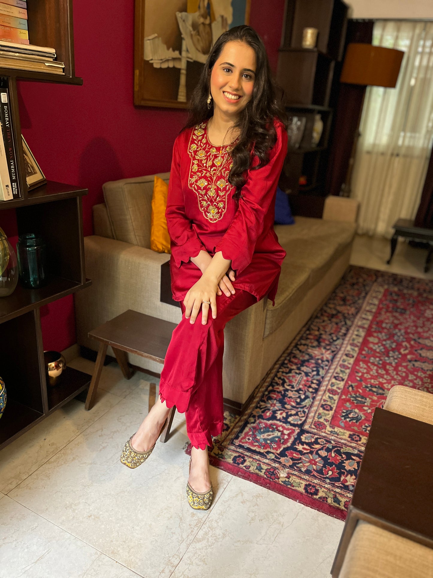 Deep red short kurta with a hand embroidered yoke and straight pants with scallop detailing