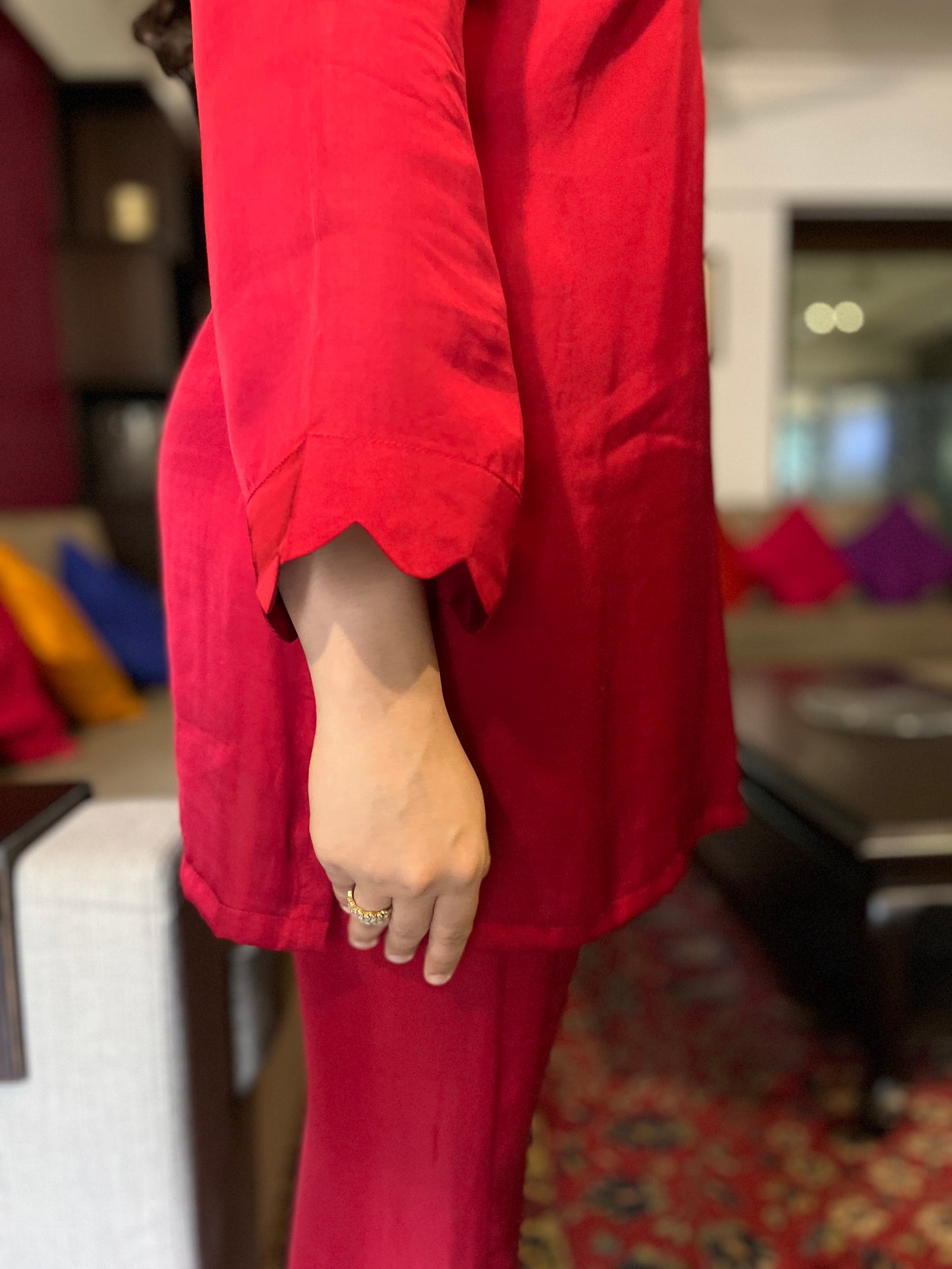 Deep red short kurta with a hand embroidered yoke and straight pants with scallop detailing