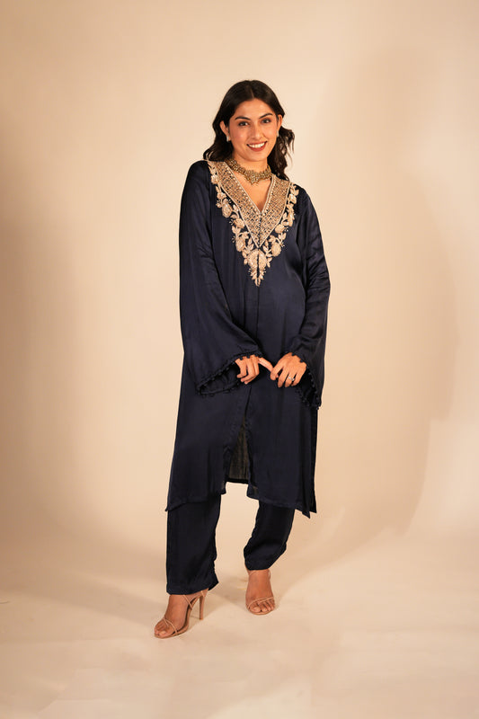 Navy blue kurta set with a hand embroidered yoke