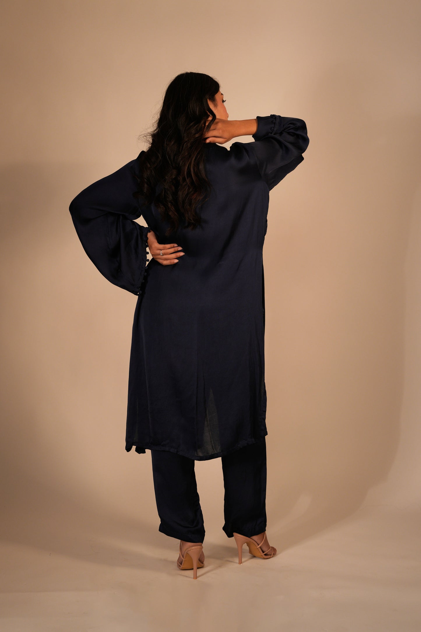 Navy blue kurta set with a hand embroidered yoke