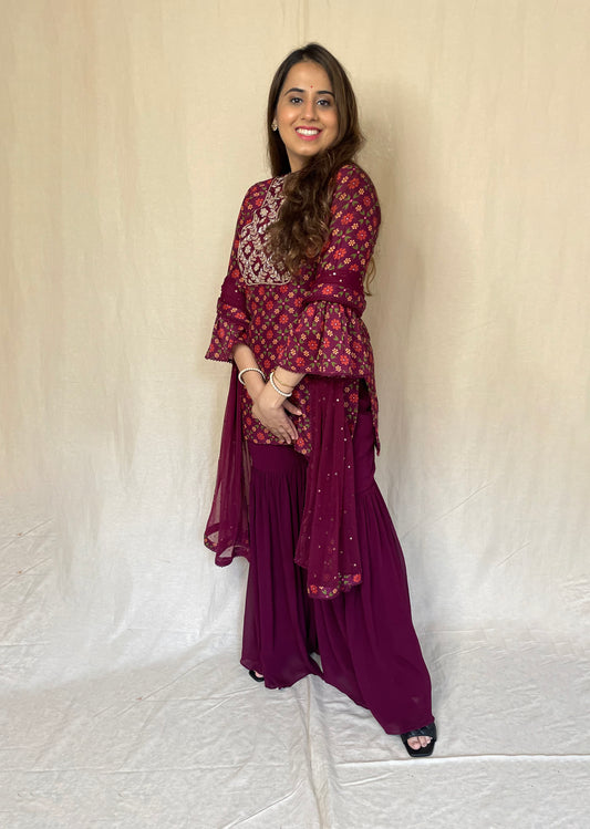 Wine floral sharara set with a hand embroidered yoke and dupatta