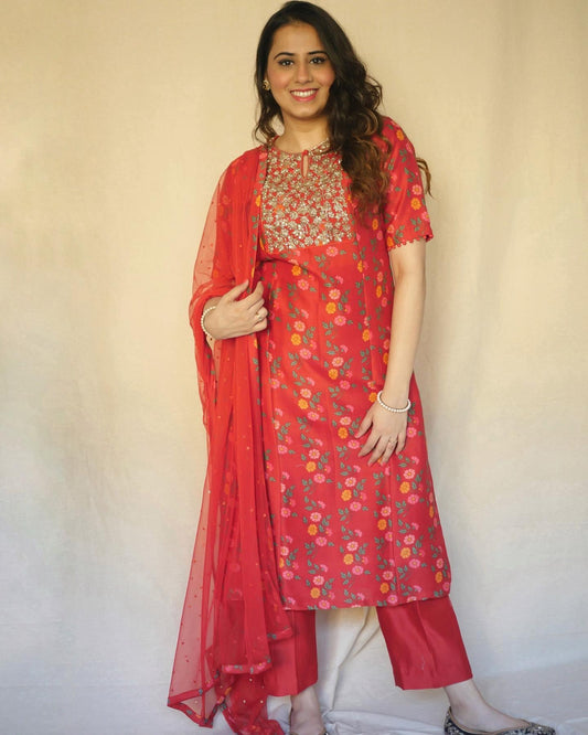 Red floral printed kurta with a hand embroidered yoke, pyjama and dupatta