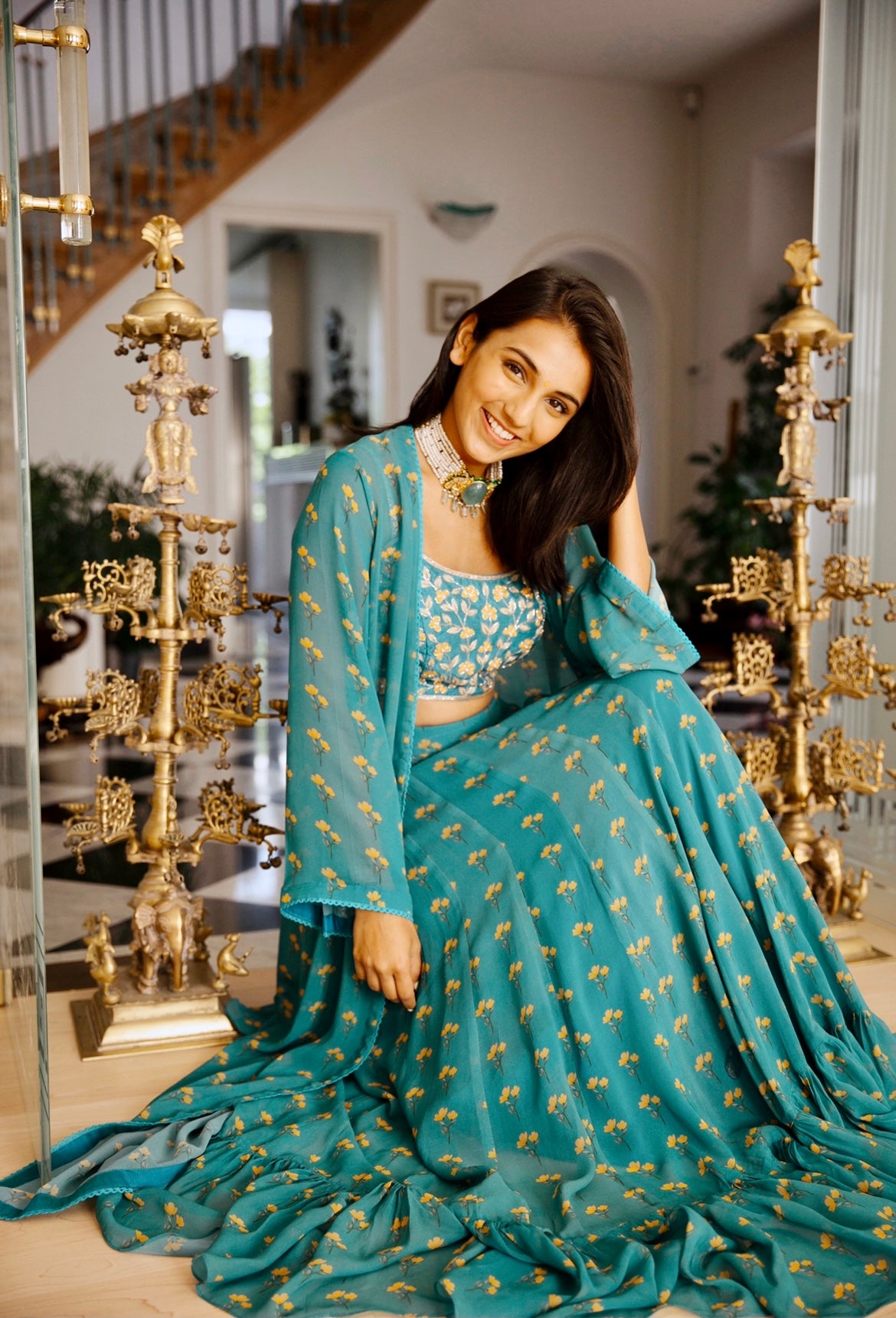 Masoom Minawala in our peacock blue floral printed lehenga and cape with an intricate hand embroidered blouse