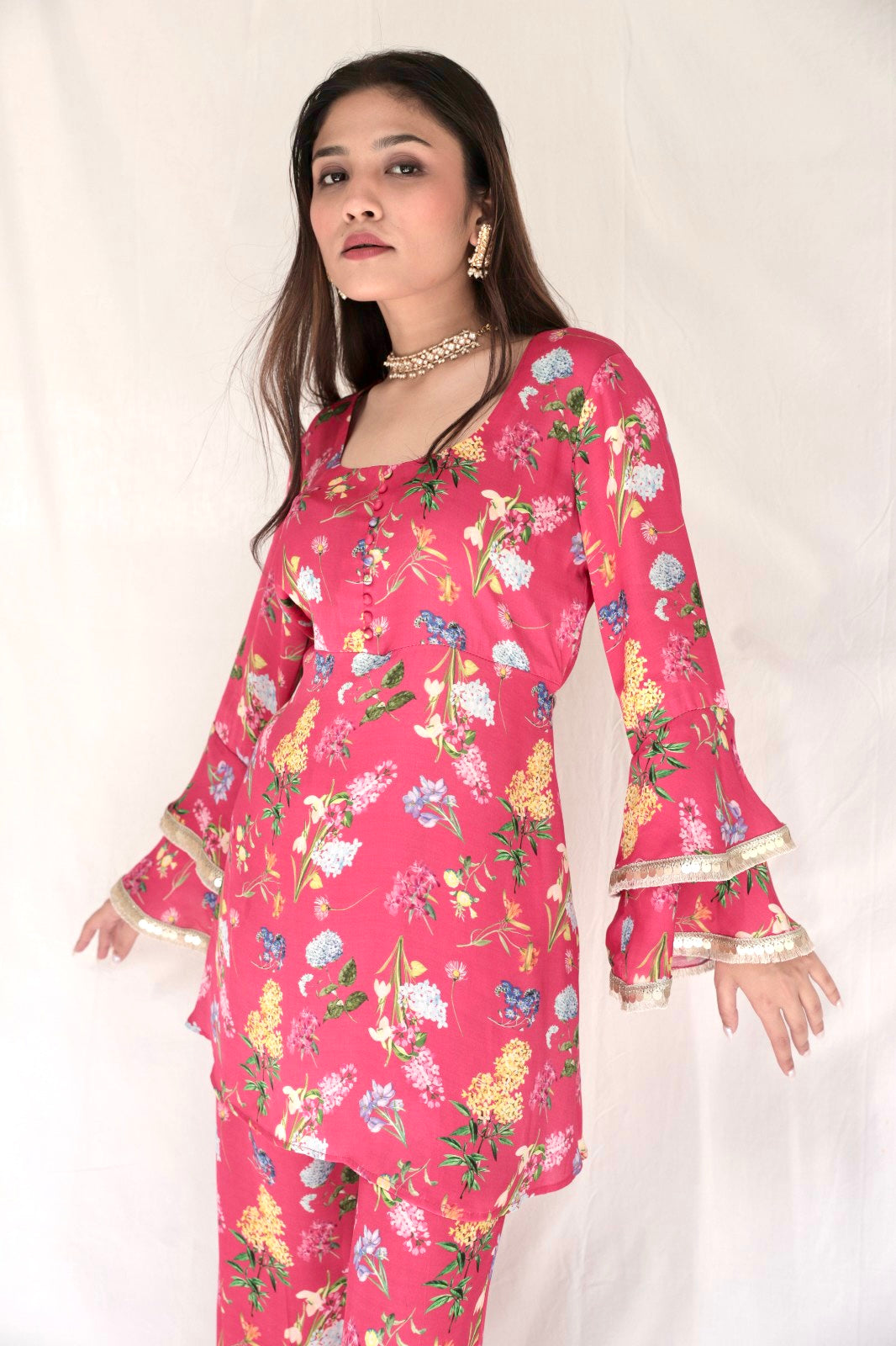Carrot red printed kurta with embellished sleeves and flared pants