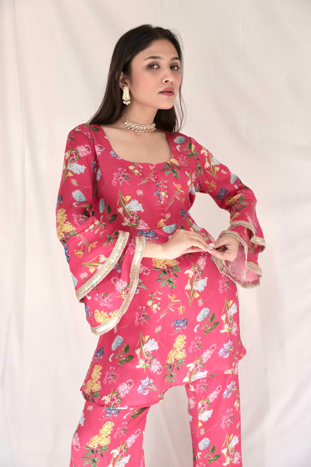 Carrot red printed kurta with embellished sleeves and flared pants