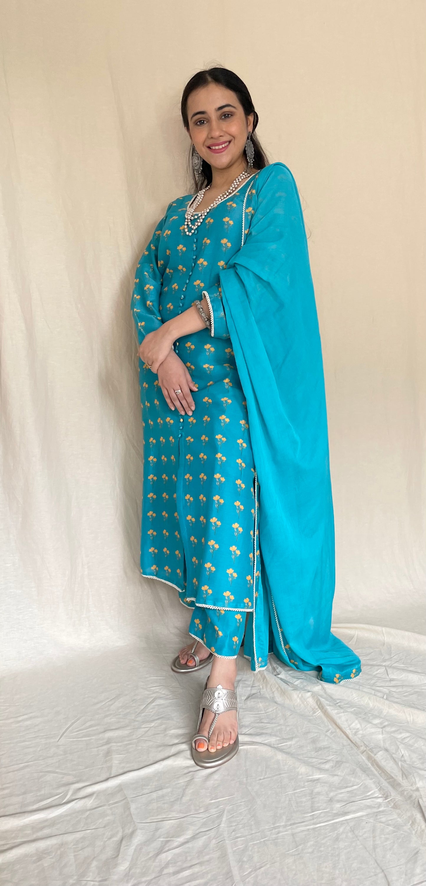 Peacock blue floral printed kurta, pyjama and dupatta with pearl edging