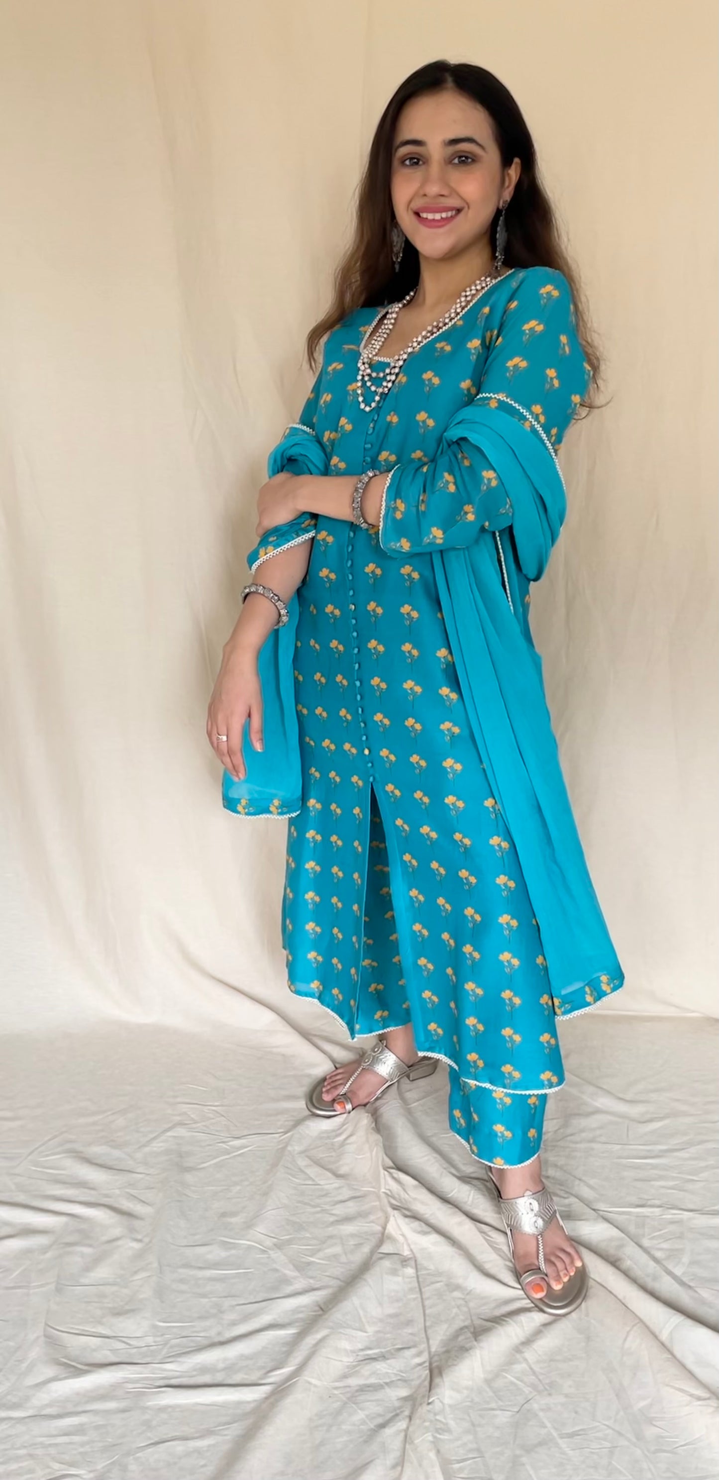 Peacock blue floral printed kurta, pyjama and dupatta with pearl edging